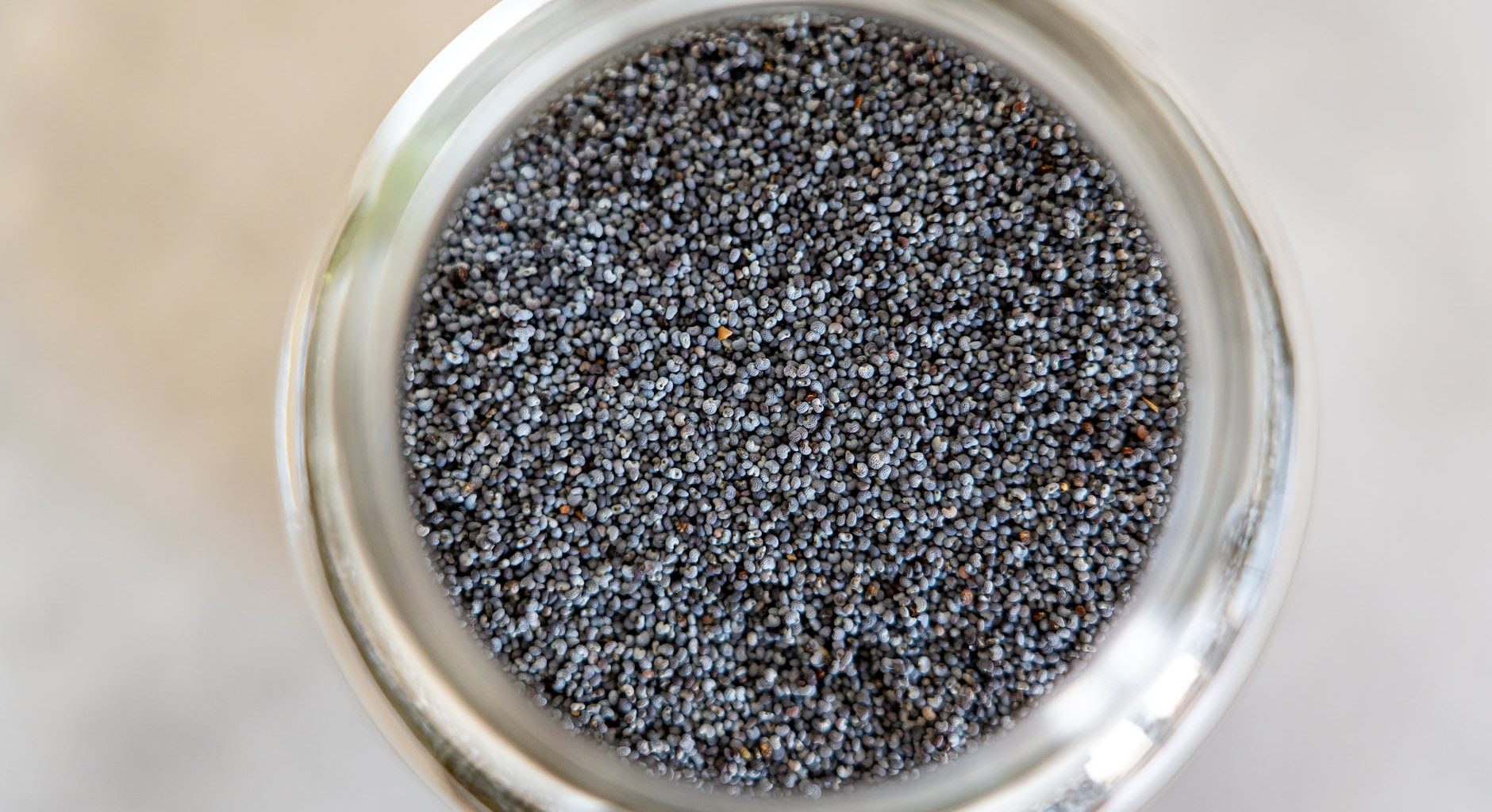 tiny size of seeds inside of a jar