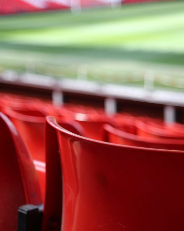 red plastic seats focus photography