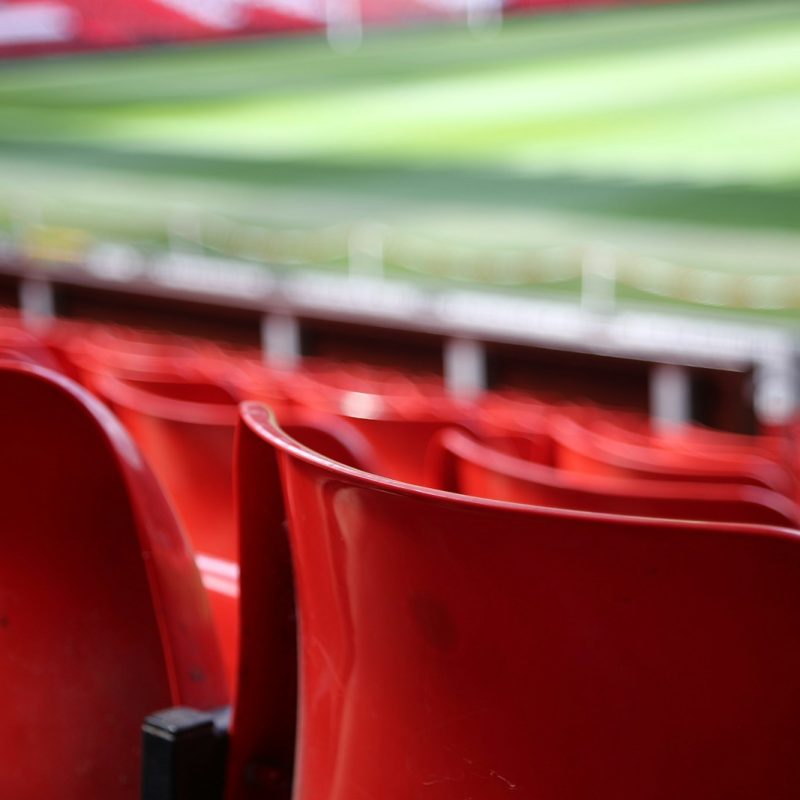 red plastic seats focus photography